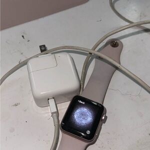 Apple Smartwatch with Pink Band and Silver Case series 3 (GPS) with charger